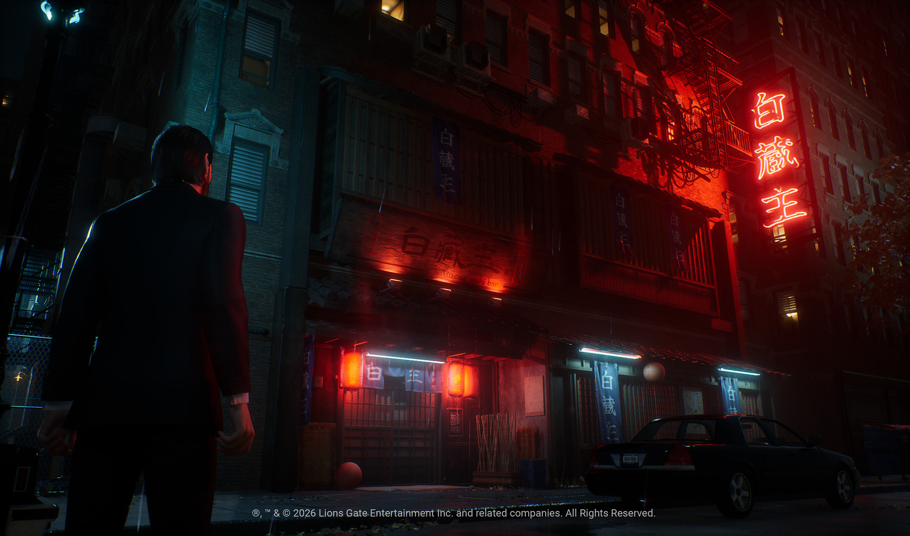 John Wick game key art showing John Wick in a stylised action pose with a dark cinematic look