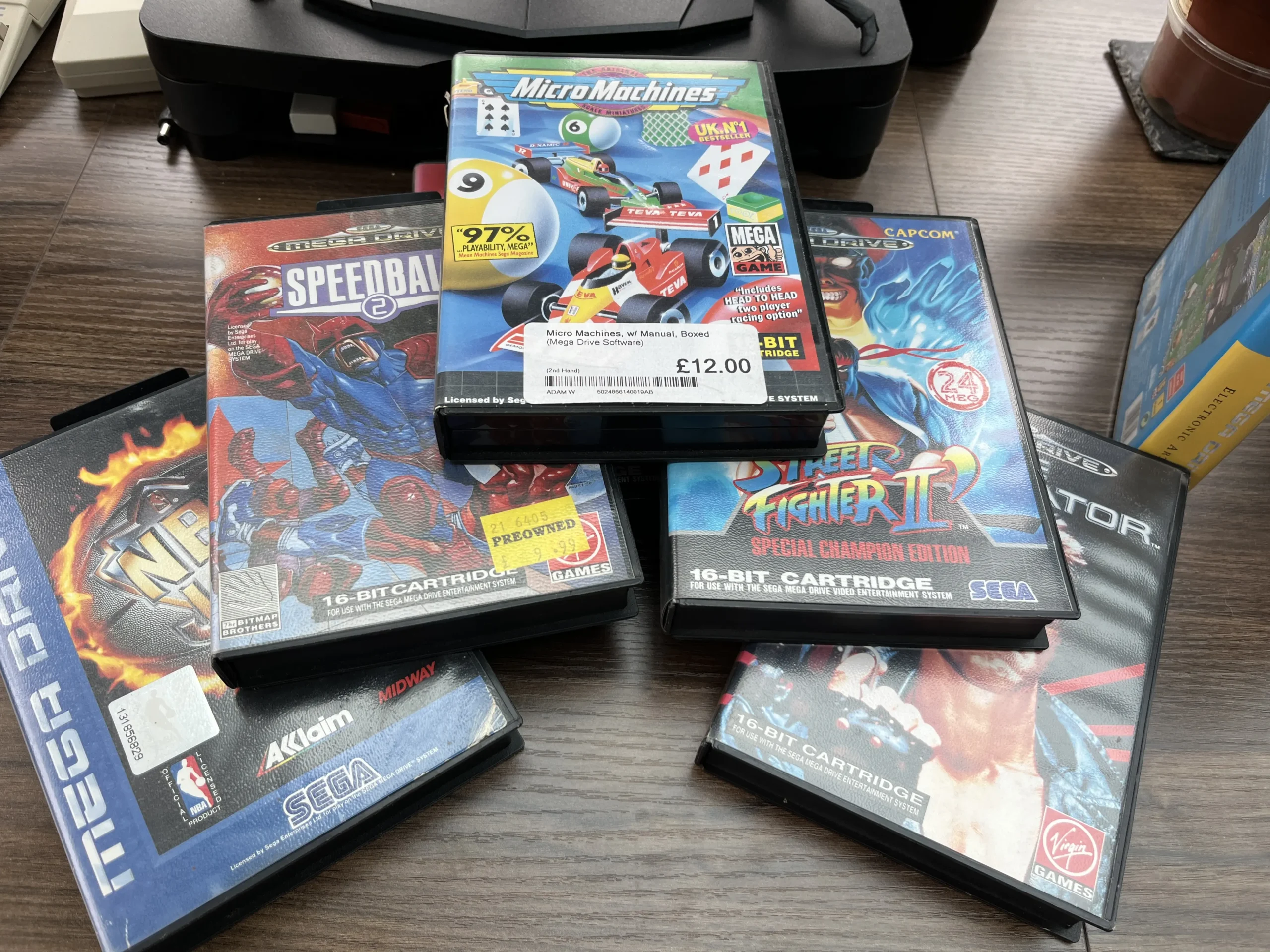 Original Sega Mega Drive cartridges for Street Fighter II Special Champion Edition and Speedball 2.